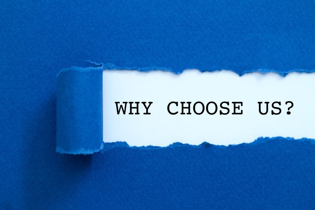 Why choose us written under torn paper.
